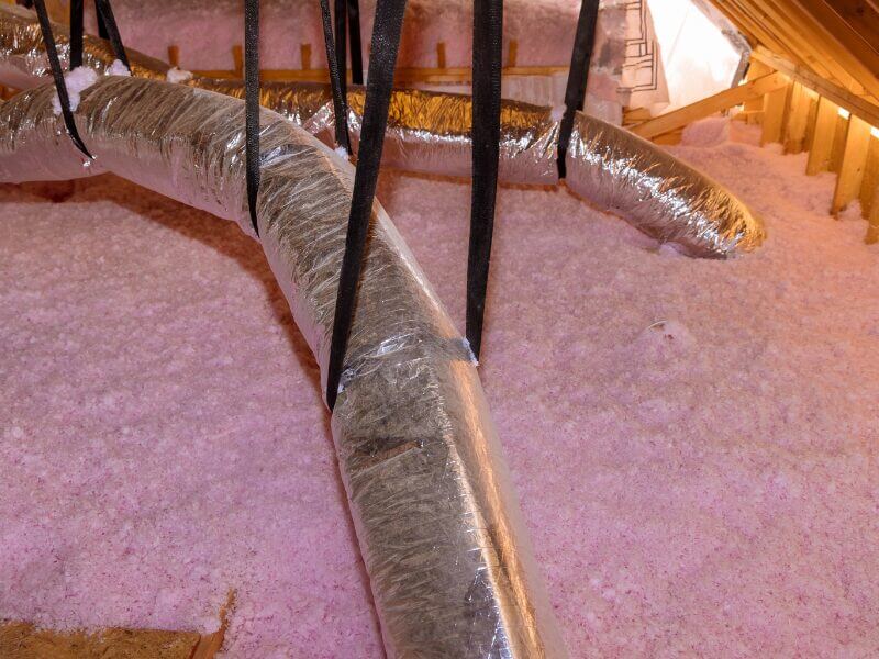 image shows blown insulation in an attic