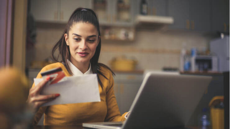 improve credit score woman checking her credit