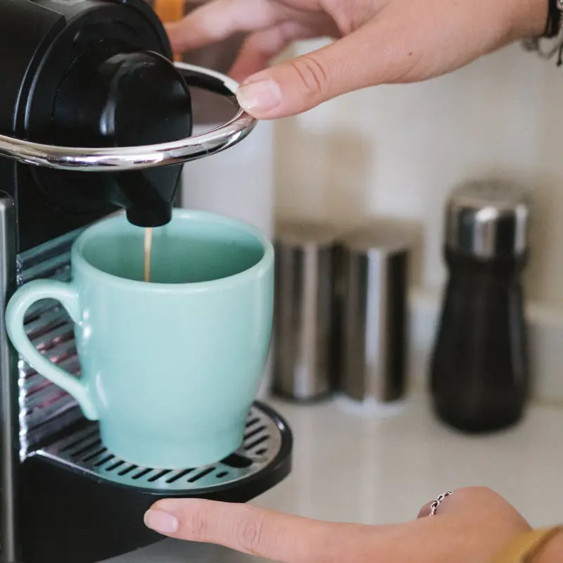 a single serve pod coffee maker like a keurig has high wattage but low kWh usage per cup making it very efficient.