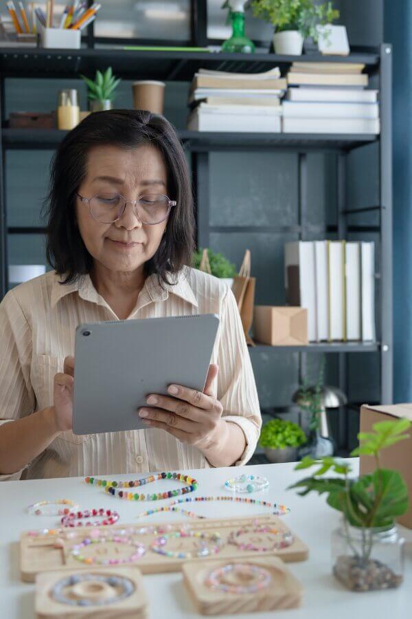 small business owner reviews her electricity bill.